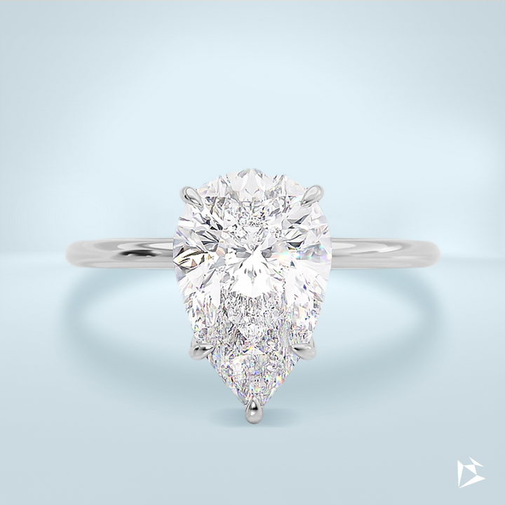 Soliter engagement ring 4 carat pear shape diamond