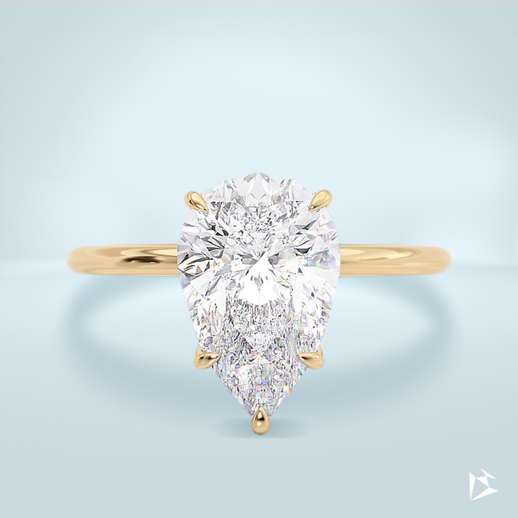 Soliter engagement ring 4 carat pear shape diamond