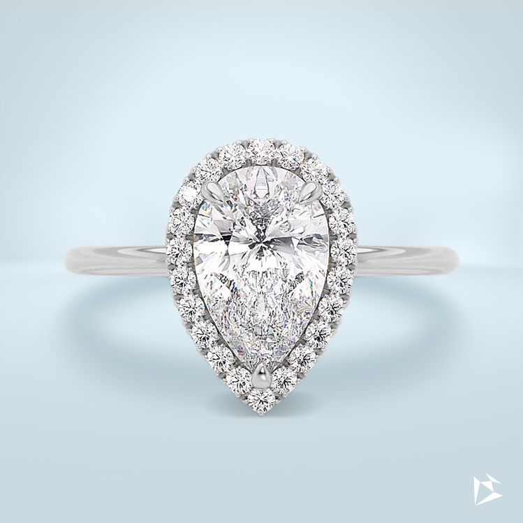 4.25 carats of diamonds halo ring the center diamond 4 carat pear shape